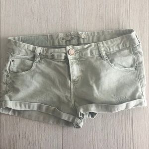 Green denim shorts